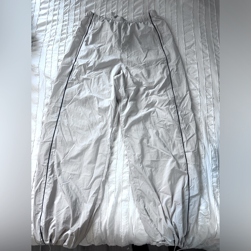 White parachute pants.